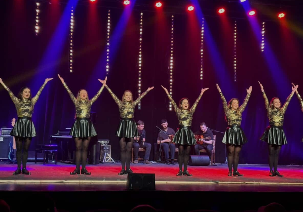 Elite Irish Dance performers outside a wedding venue, ready to entertain guests